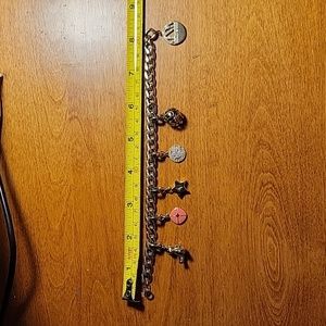 Fossil gold tone curb link charm bracelet